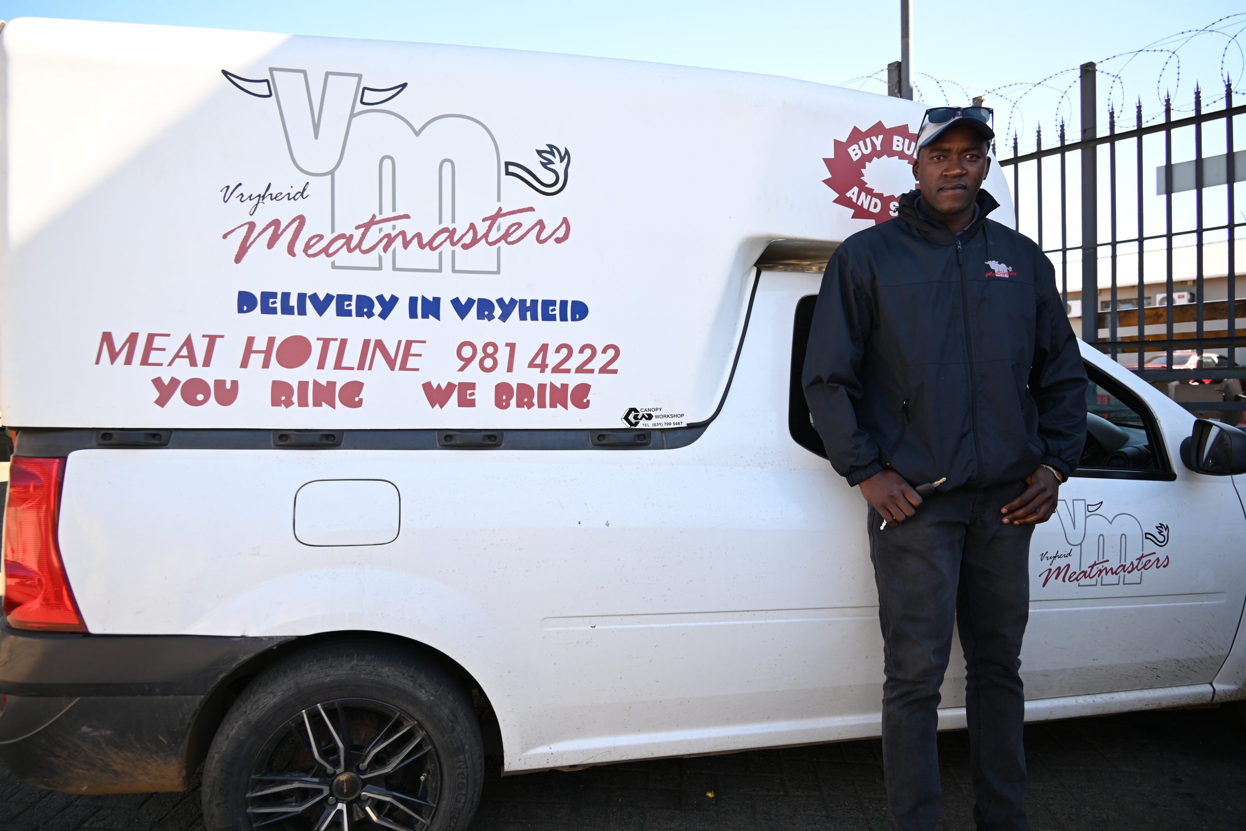 Vryheid Meatmasters delivery van with driver, You Ring We Bring meat hotline 034 981 4222
