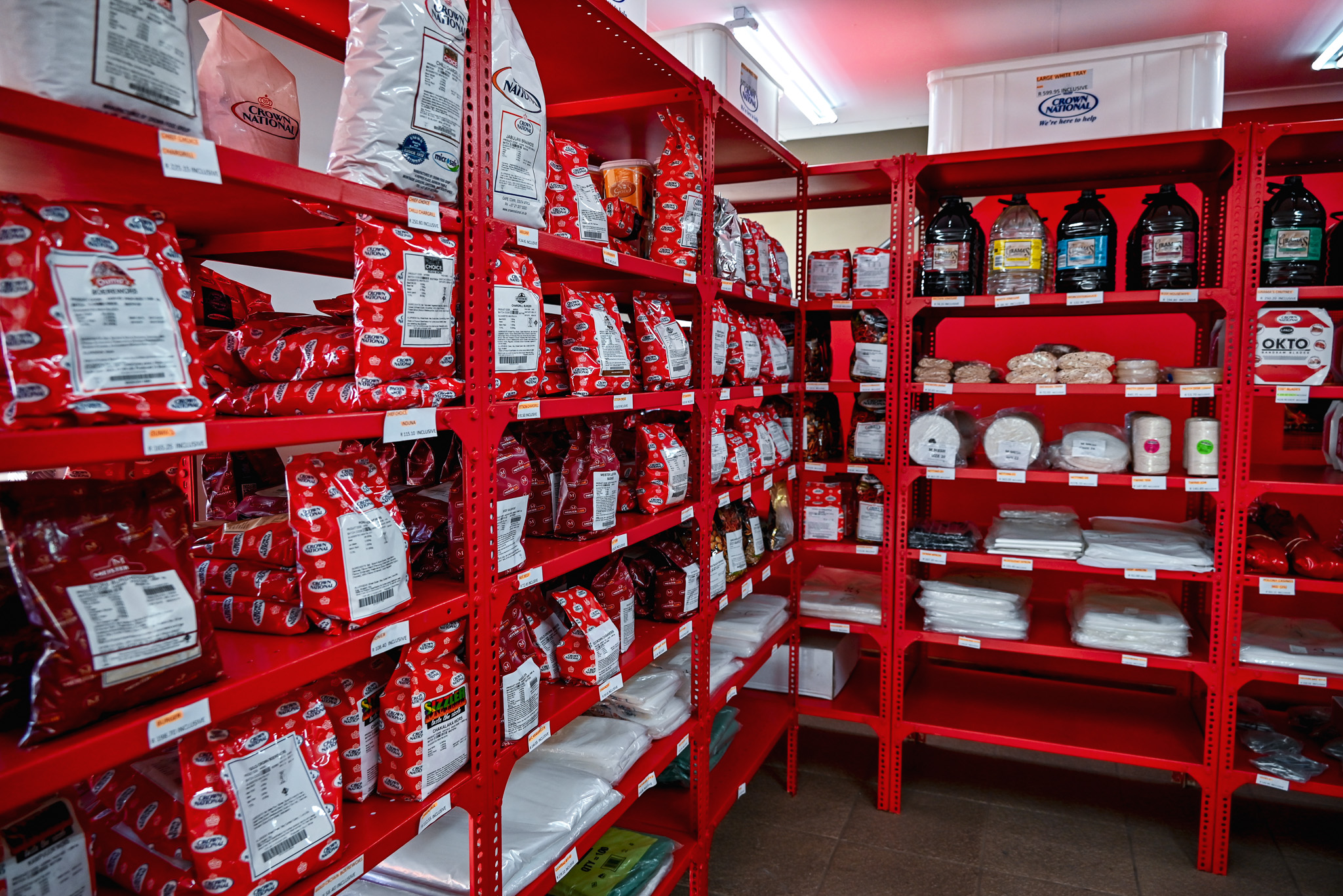 Shelves of Crown National spices and butchery supplies at the Meatmasters Butchery Supplies shop in Vryheid